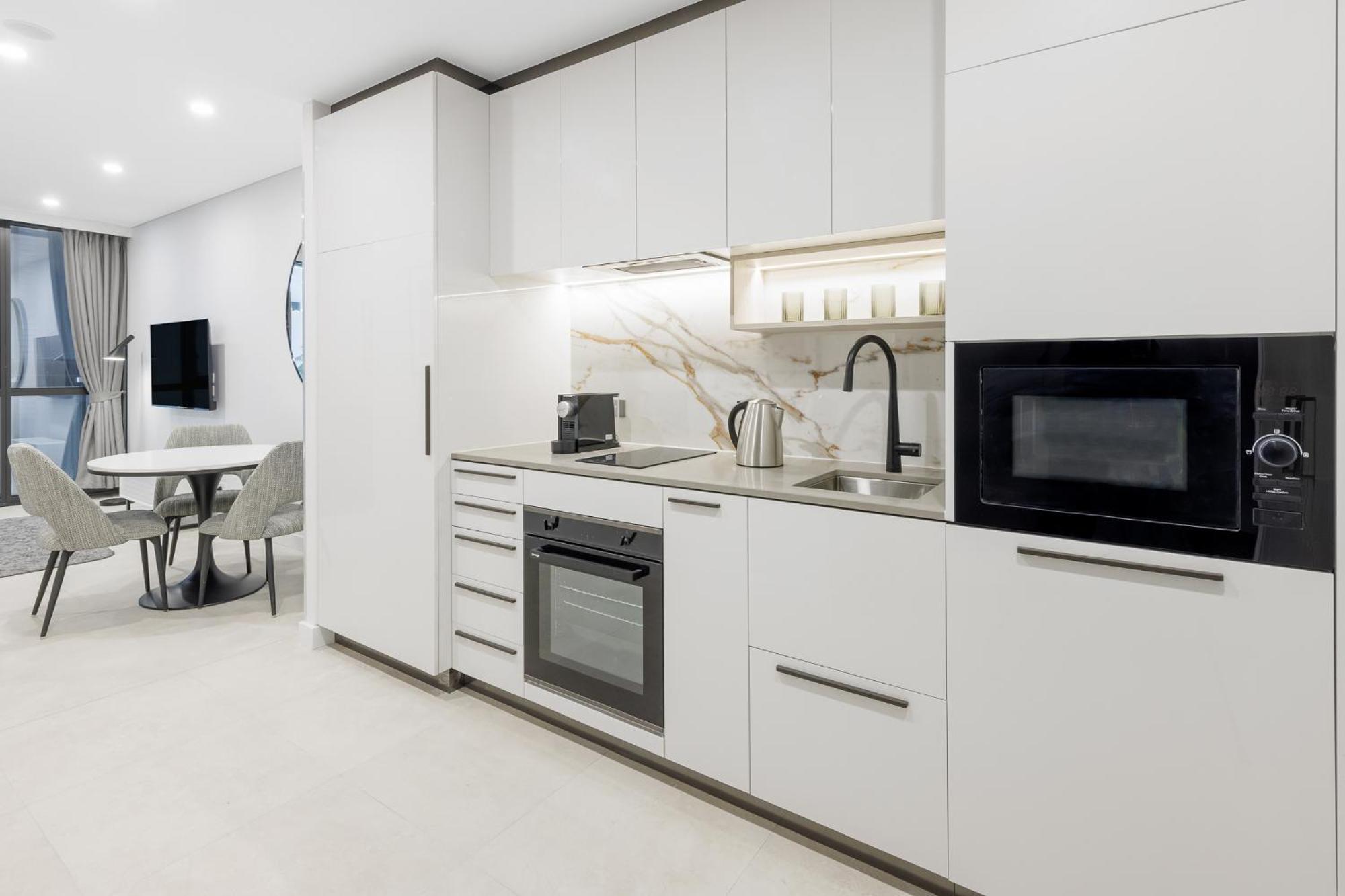 Meriton Suites แคนเบอร์รา ภายนอก รูปภาพ A typical kitchen in a serviced apartment