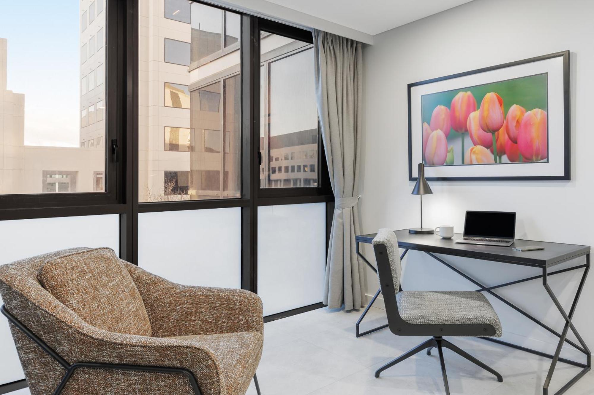Meriton Suites แคนเบอร์รา ภายนอก รูปภาพ A typical apartment at The Met
